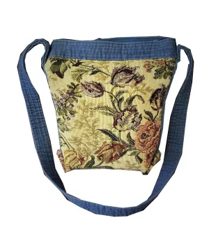 Bags made of tapestry with a long blue-gray handle and a zipper