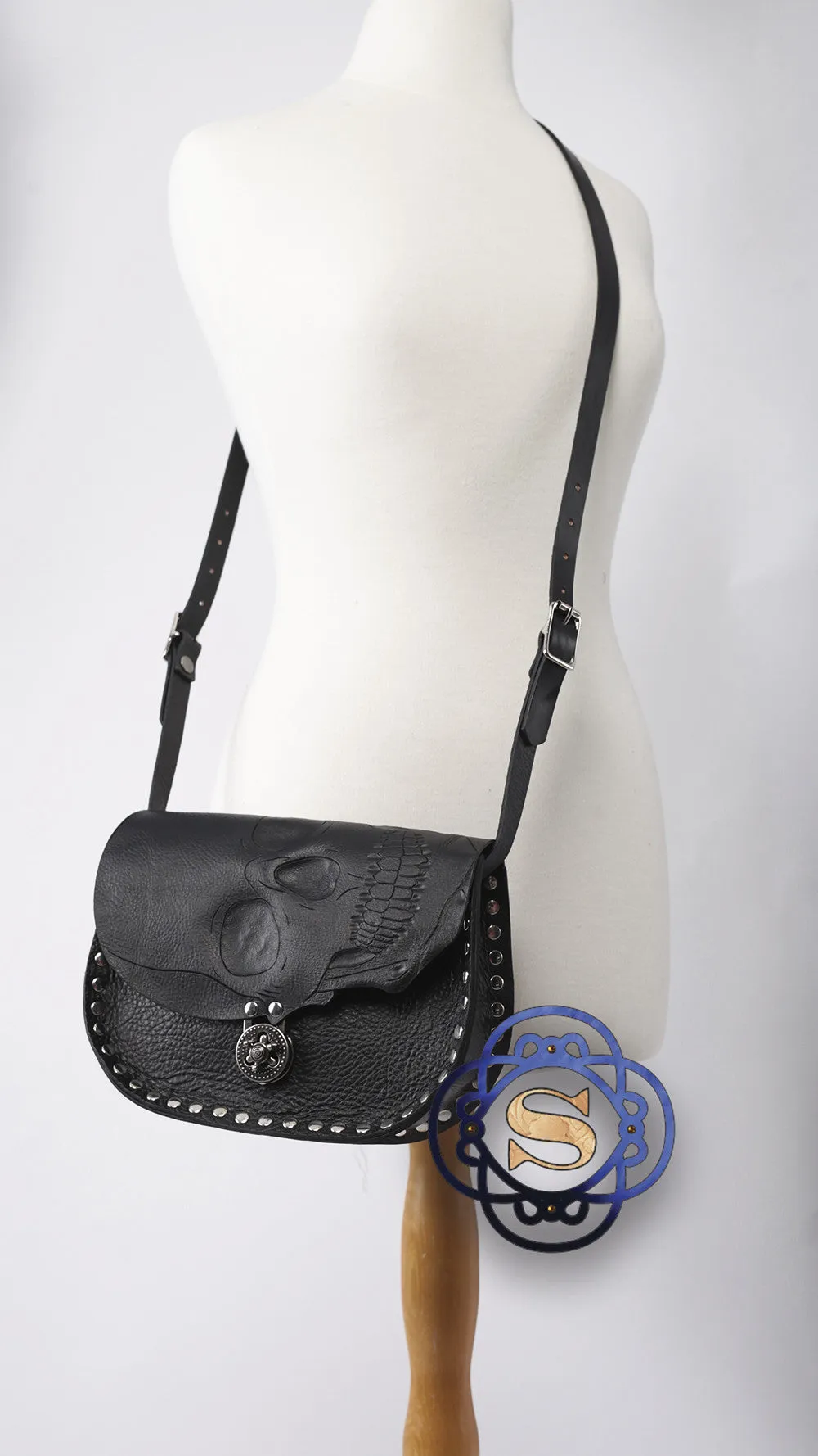 Black skull on flap cross body bag