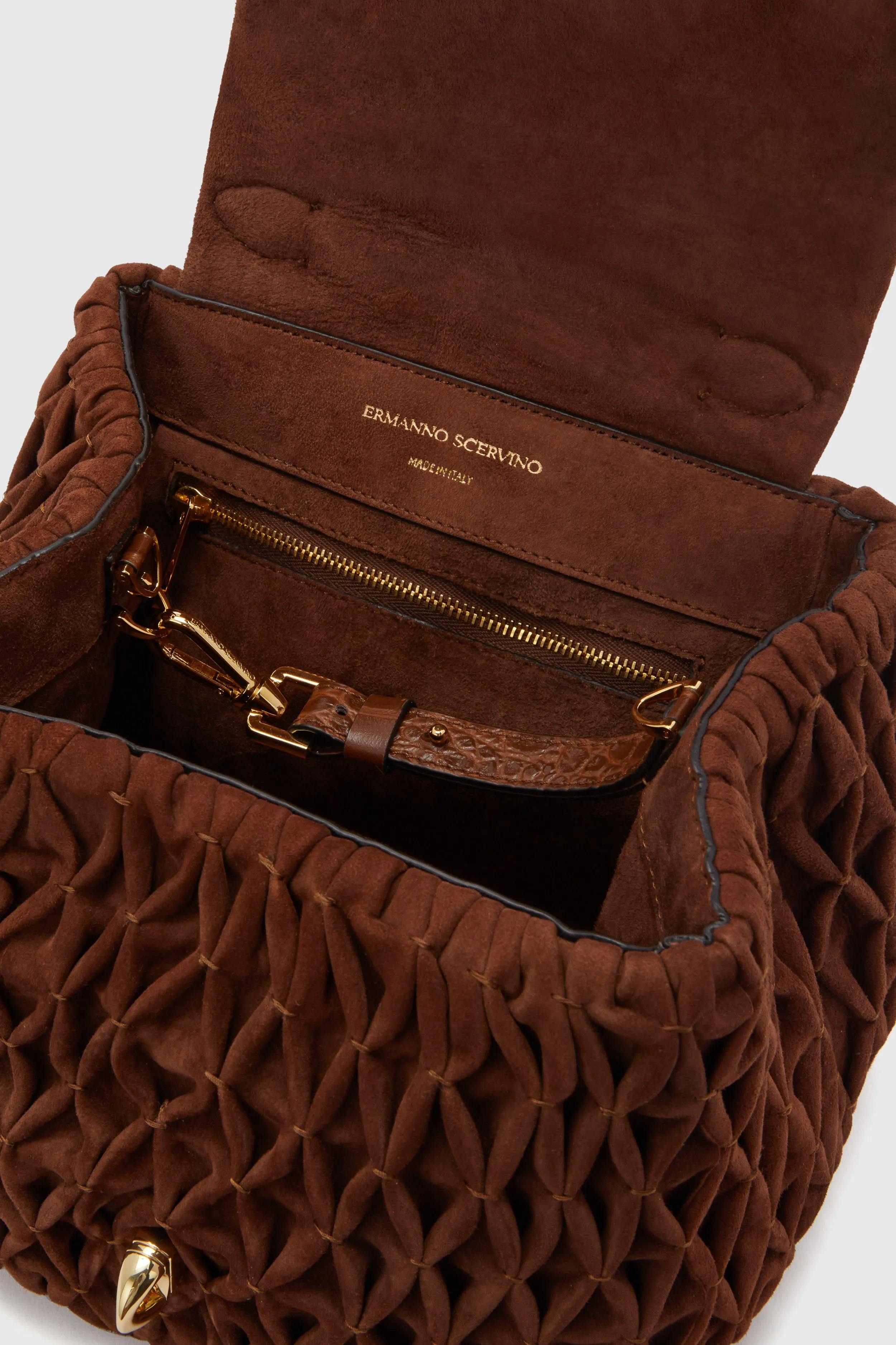 Flap bag in suede and calfskin