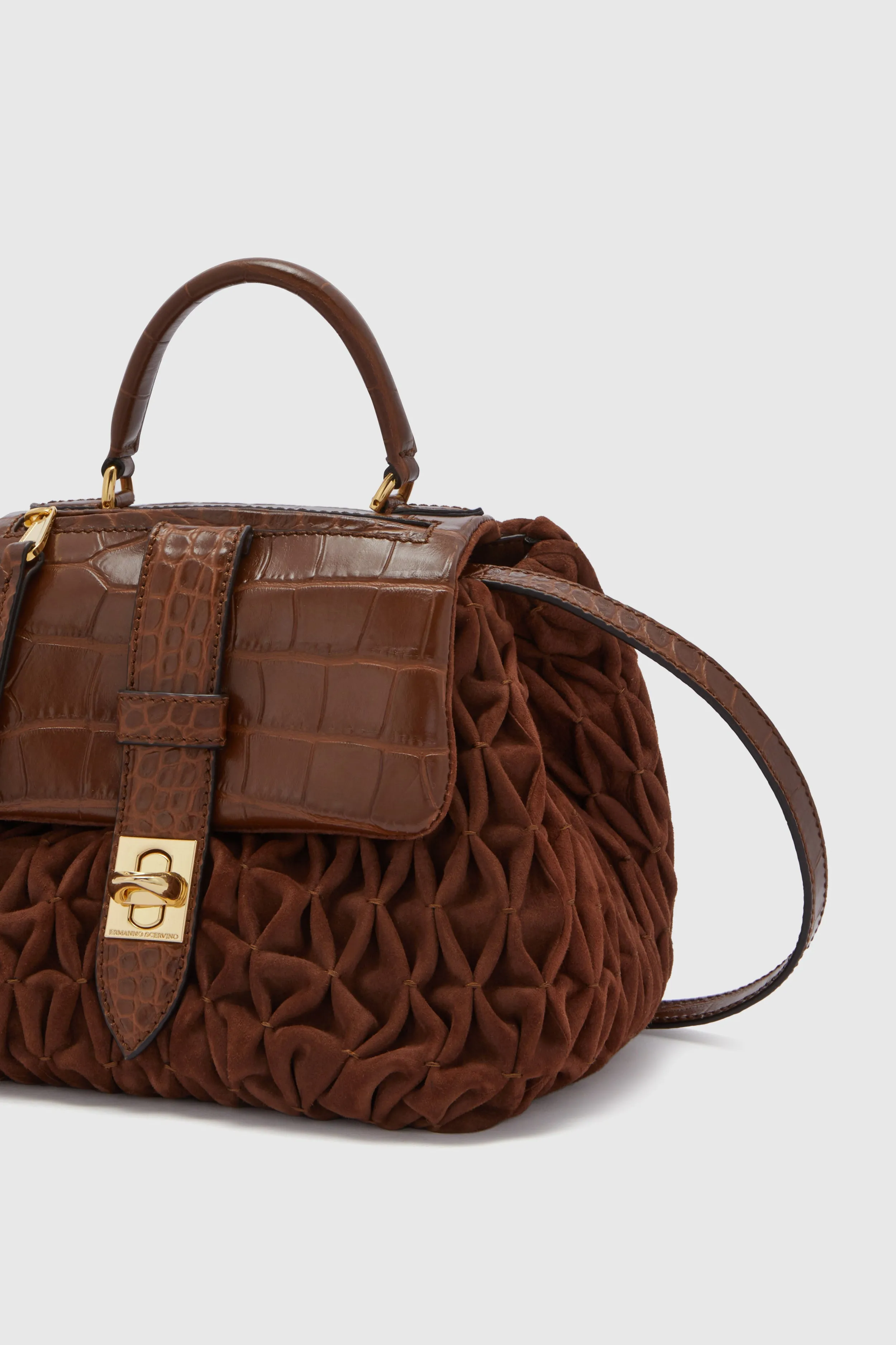 Flap bag in suede and calfskin