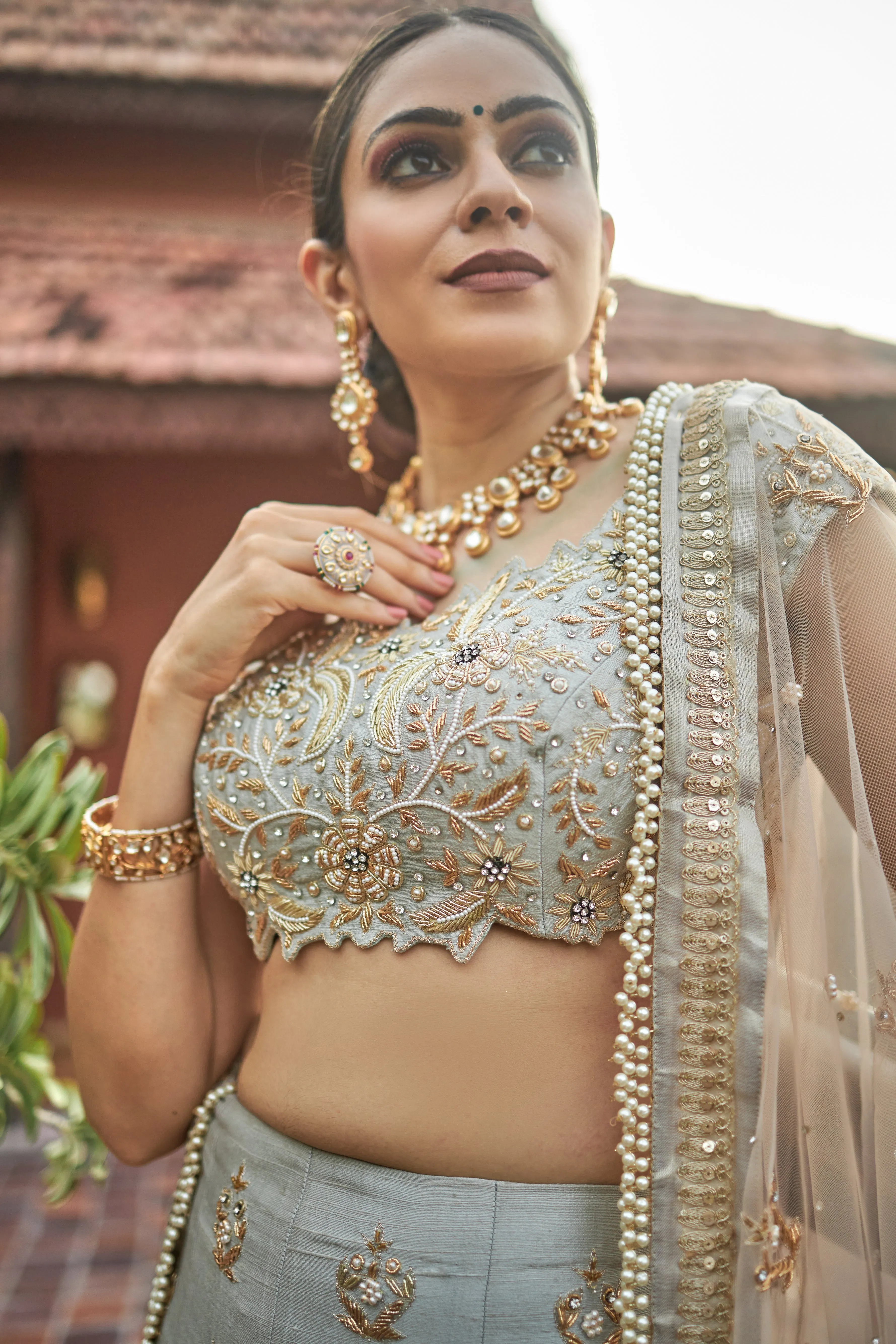 Sea green lehanga choli in raw silk with zardoshi and pearl work