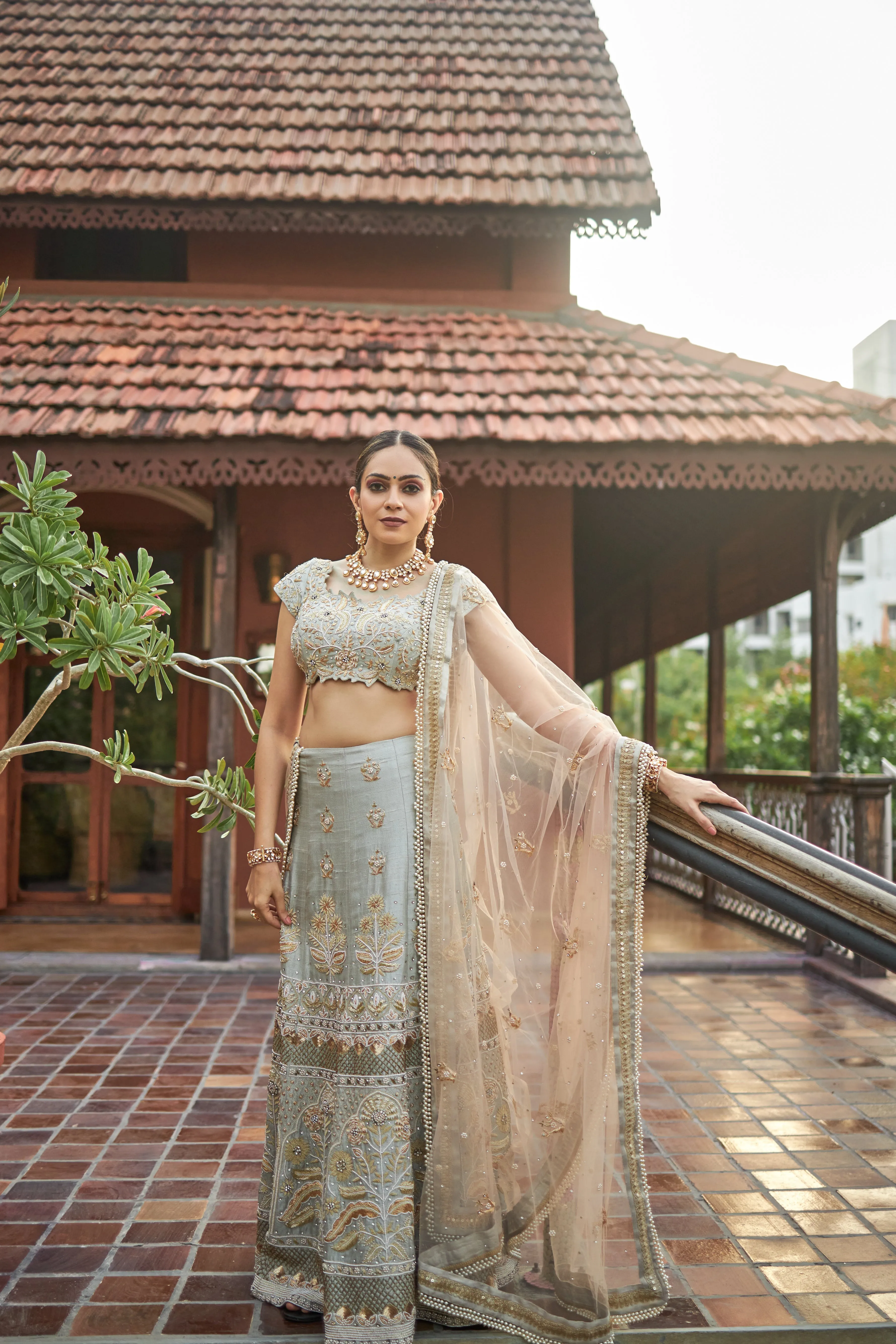 Sea green lehanga choli in raw silk with zardoshi and pearl work