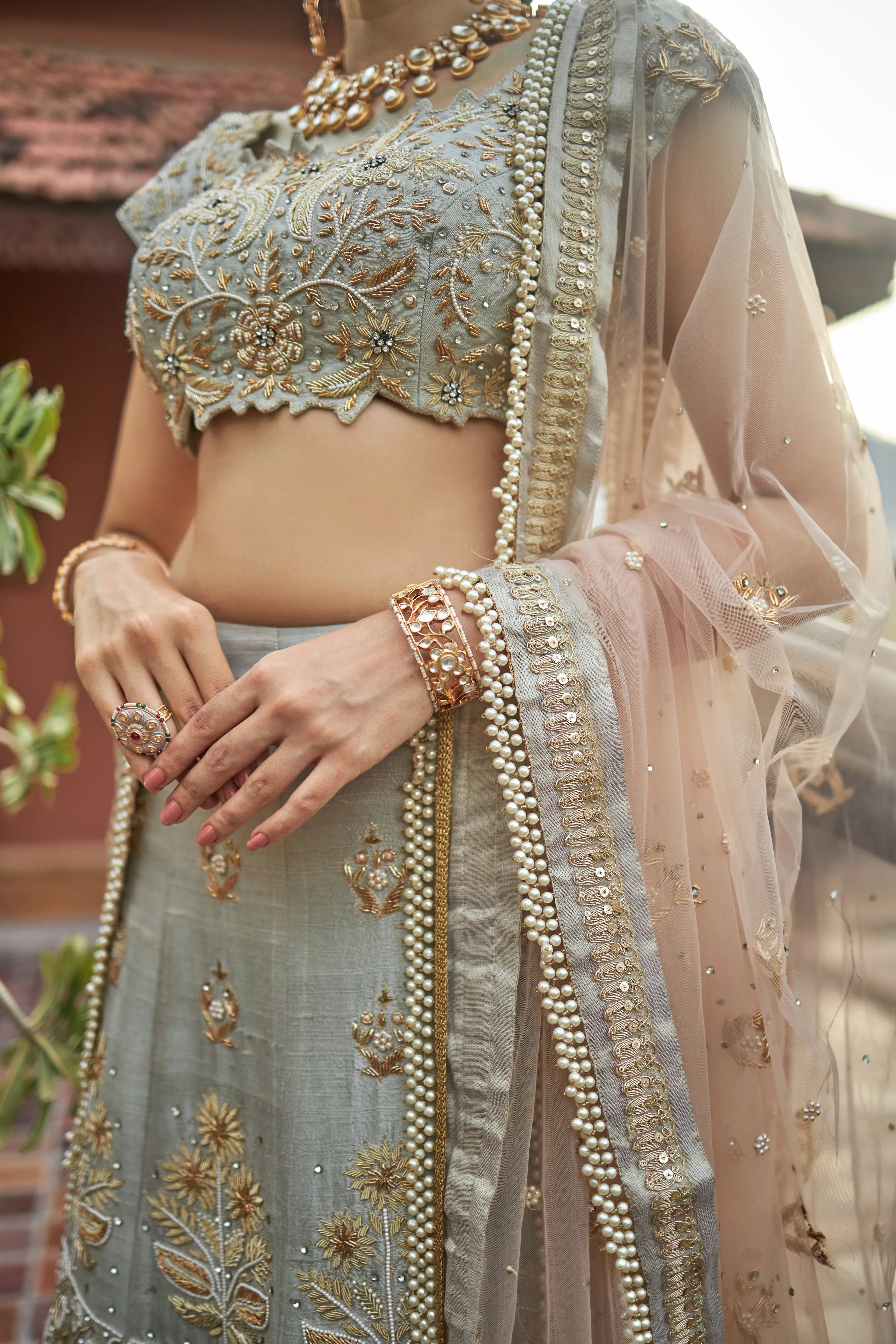 Sea green lehanga choli in raw silk with zardoshi and pearl work