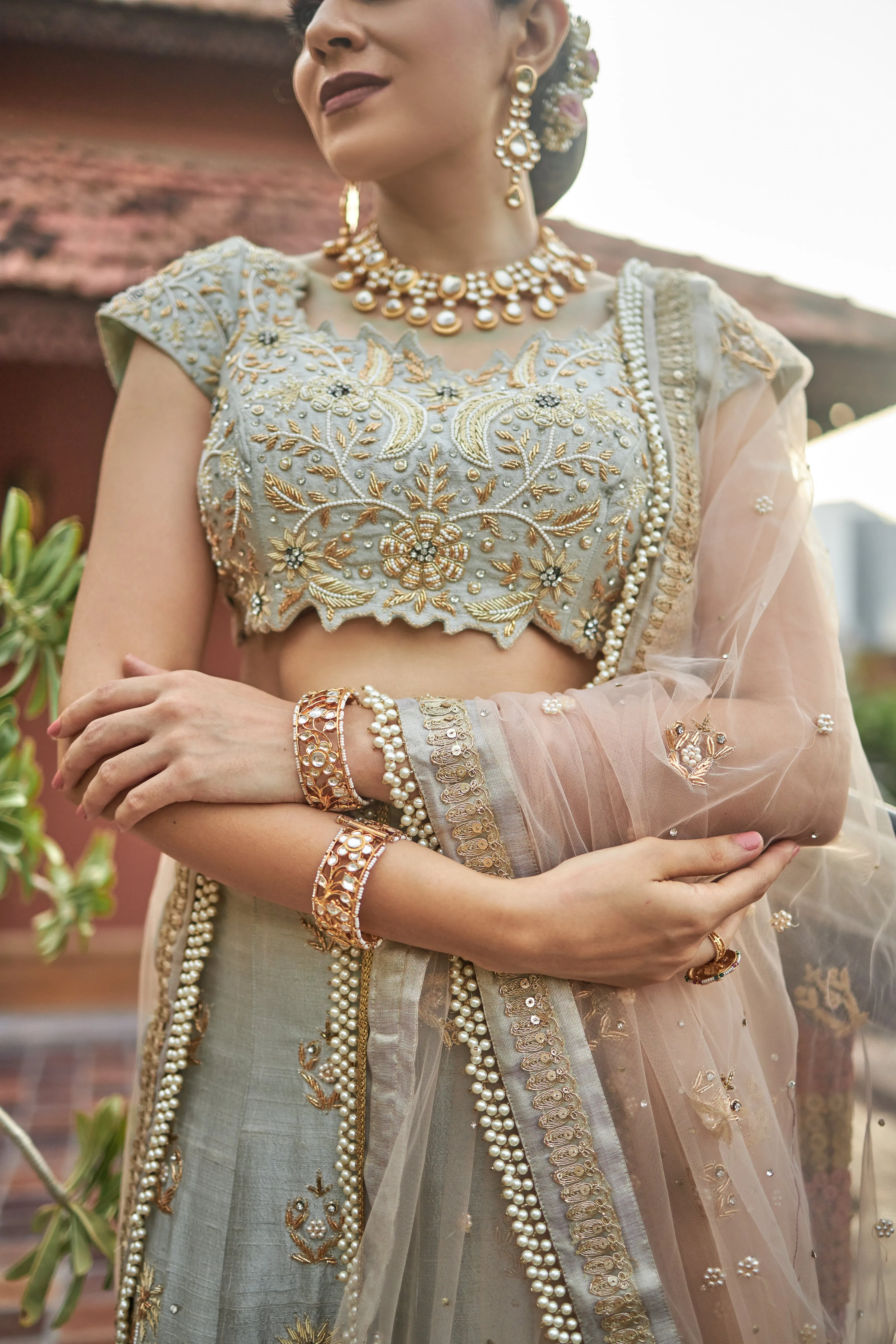 Sea green lehanga choli in raw silk with zardoshi and pearl work