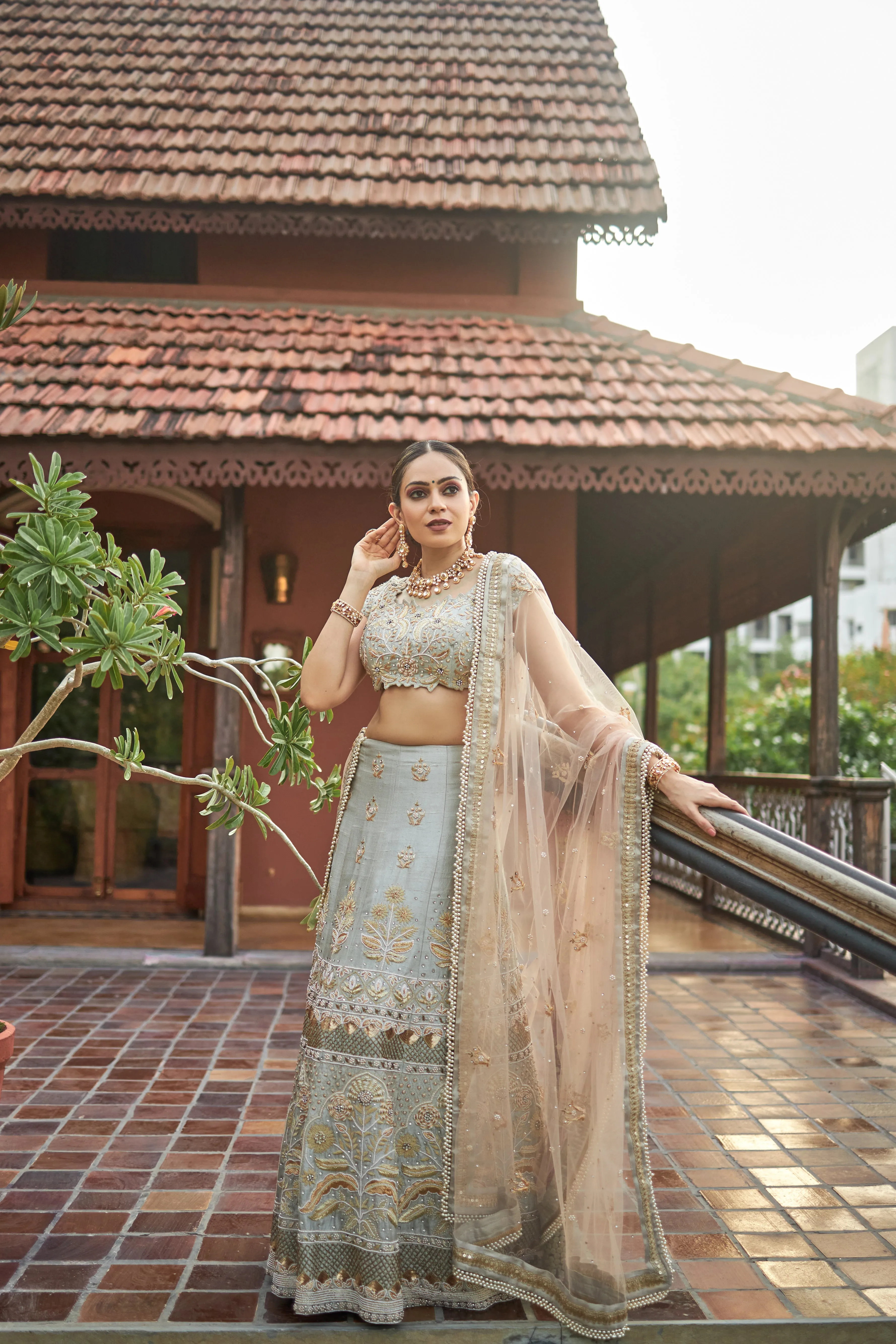 Sea green lehanga choli in raw silk with zardoshi and pearl work