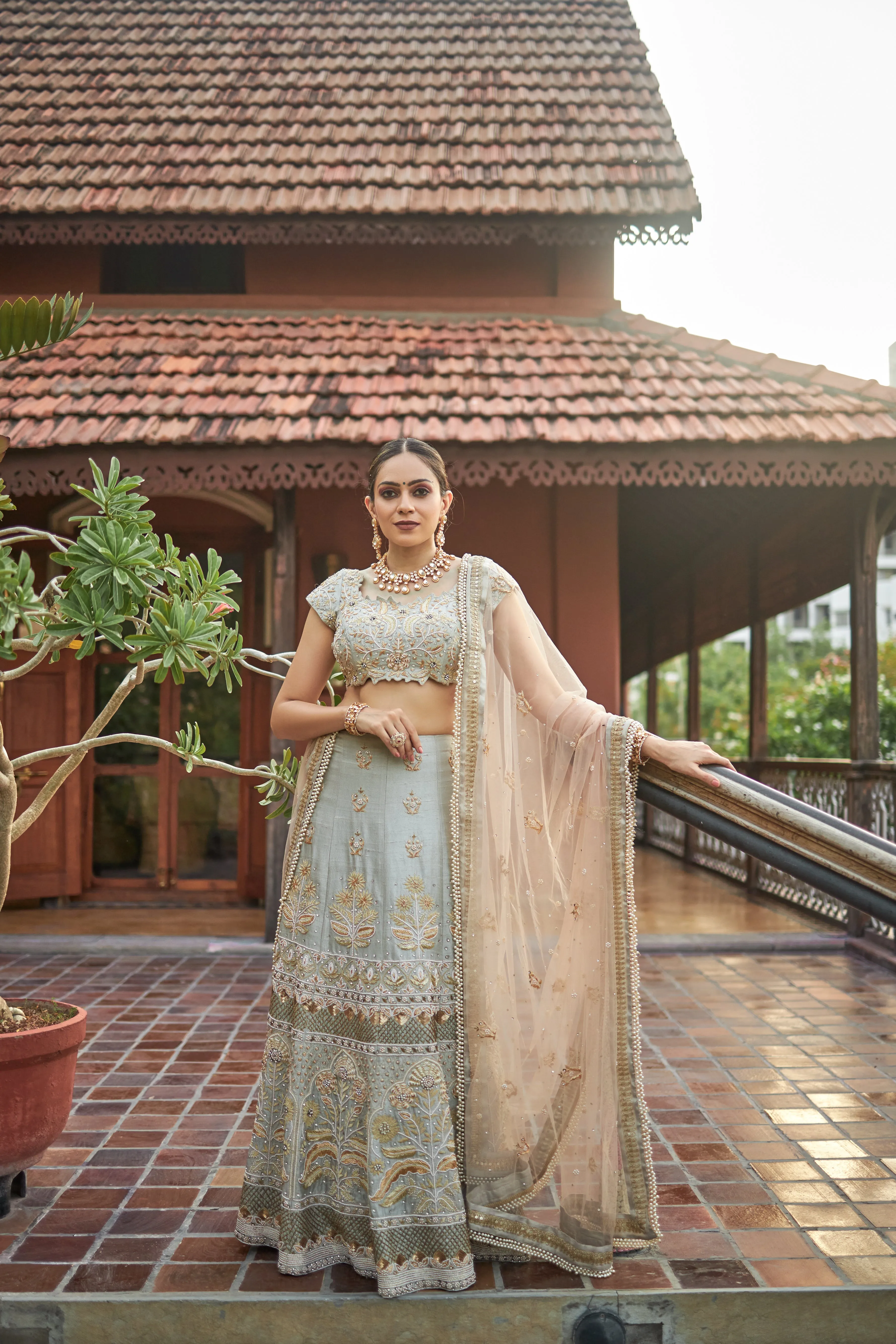 Sea green lehanga choli in raw silk with zardoshi and pearl work