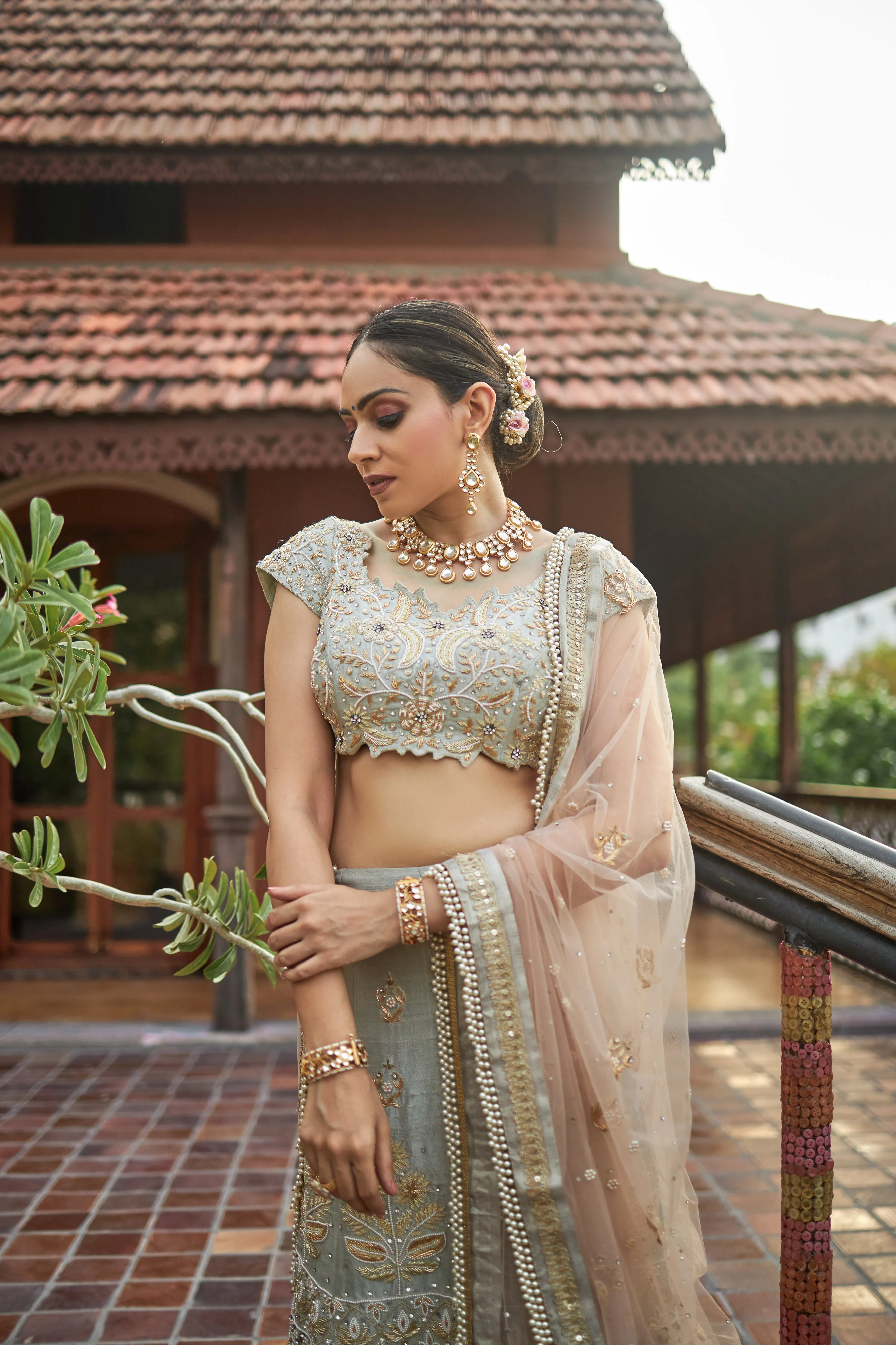 Sea green lehanga choli in raw silk with zardoshi and pearl work