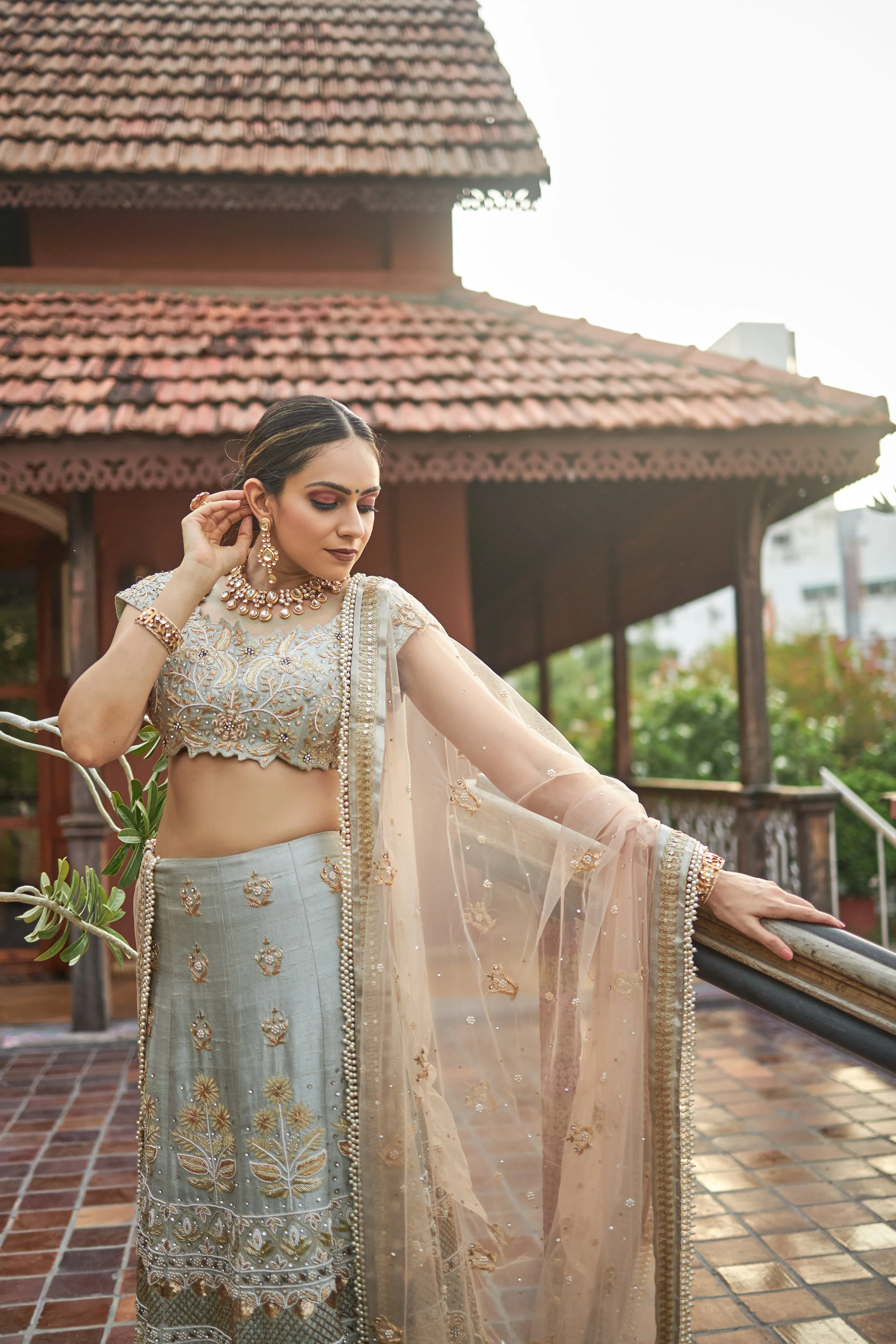 Sea green lehanga choli in raw silk with zardoshi and pearl work